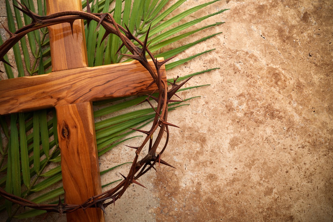 Crown of Thorns, Cross and Palm Leaves. Palm Sunday and Easter Day Concept.